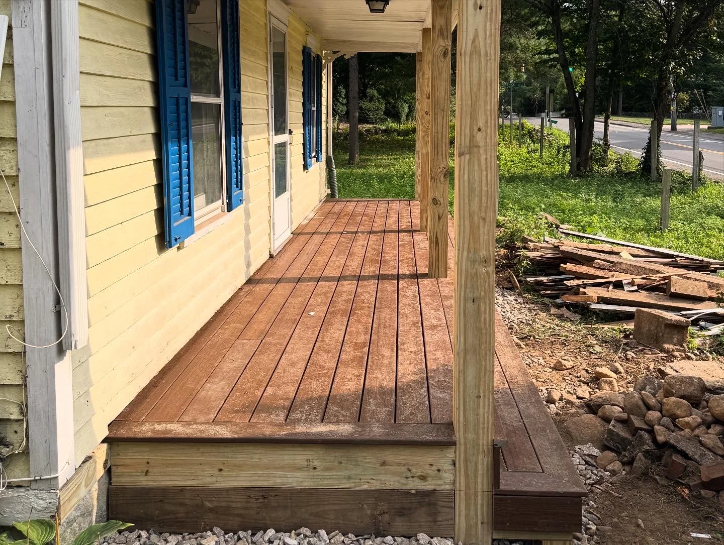 Rebuilt front porch with new decking and support posts